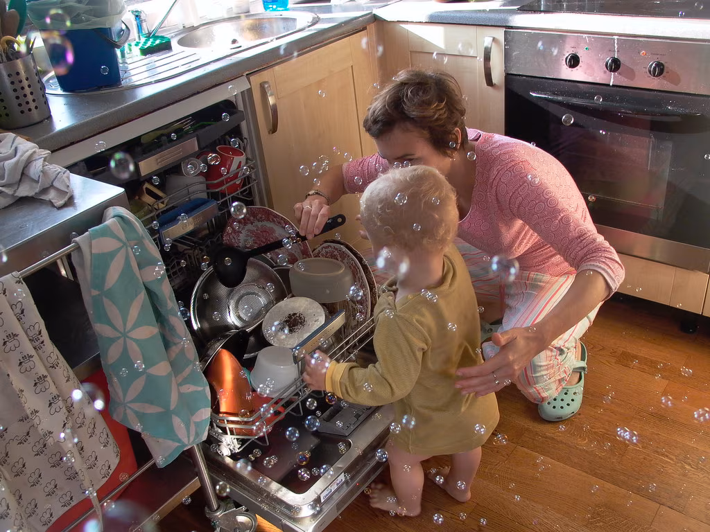 Modern kitchen with dishwasher requiring professional repair